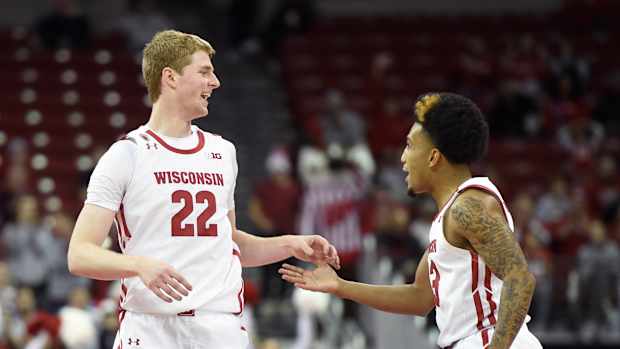 Steven Crowl and Chucky Hepburn celebrate after beating Lehigh.